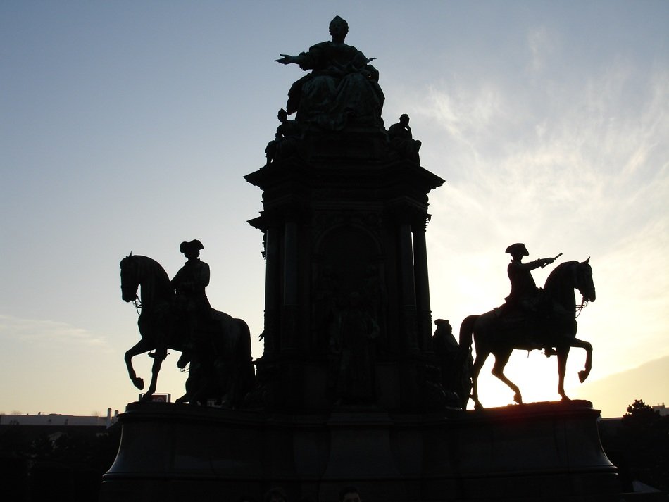 big monument in belgium in the sunset