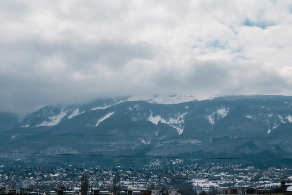 panorama of the city at the foot of the mountains