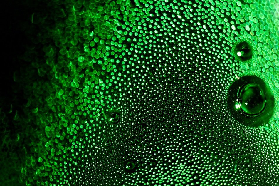 green bubbles bottle surface