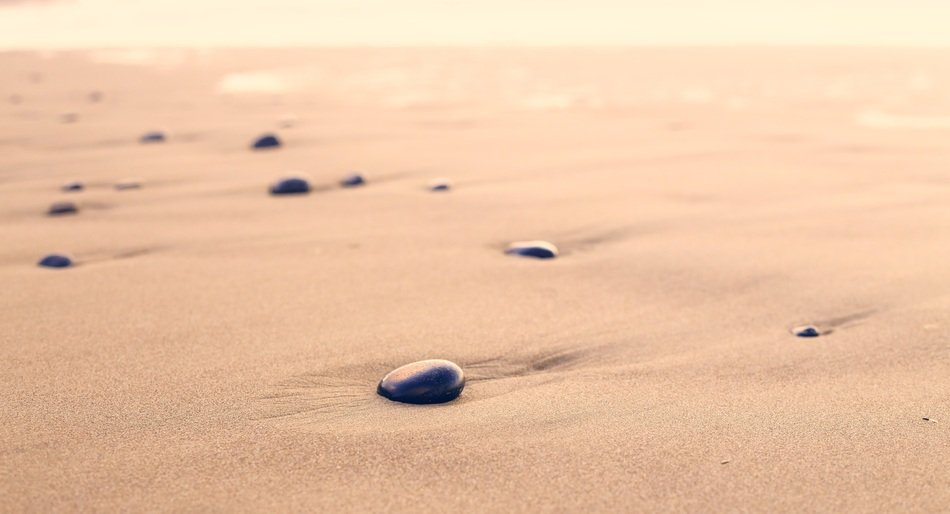 pebbles sand beach rounded shape