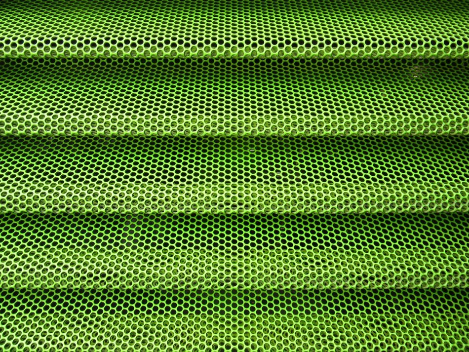 perforated sheet green color holes background