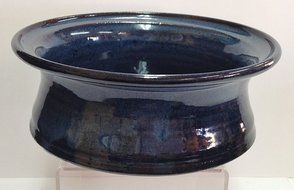 Handmade pottery brie baker with recipe.