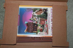 The 1996 Longaberger Pottery Gingerbread Country Cabin Mold