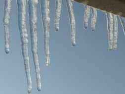 transparent icicles on the roof