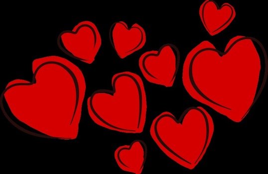red Hearts at black background