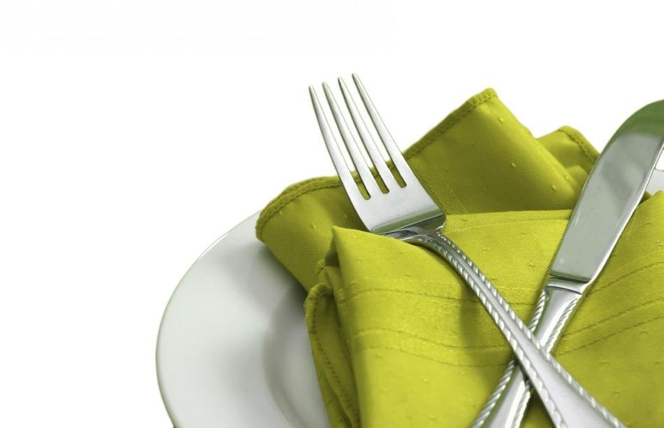 Metal fork and knife on the towel
