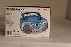 Sylvania SRCD243PL Portable CD Player with AM/FM Radio Boombox, Pink or Blue N2