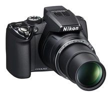 Nikon Coolpix P100 10 MP Digital Camera with 26x Optical Vibration Reduction (VR) Zoom and 3-Inch LCD (Black)... N2