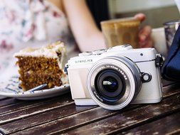 Olympus E-PL7 16MP Mirrorless Digital Camera with 3-Inch LCD with EZ Double Zoom Kit 12-42mm f/3.5-5.6 + 40-150mm... N12