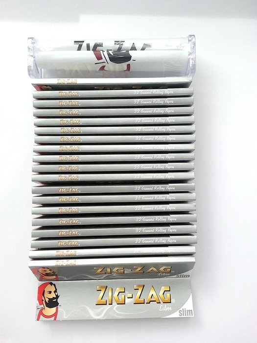 20 PACK- 32 ZIG ZAG SILVER KING SIZE SLIM ROLLING PAPERS & FREE Zig Zag Roller!