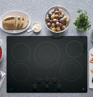 PP7030DJBB 30" Built in Electric Cooktop with 5 Radiant Cooking Elements, Front Center Control Knobs, Hot Surface...