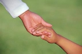 hold baby's hand