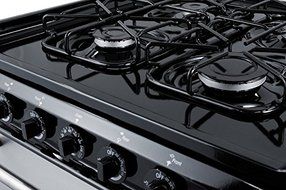 Summit TTM63027BKSW 24" wide gas range with sealed burners, stainless steel doors, and deluxe backguard; replaces... N2