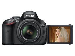 Nikon D5100 16.2 MP CMOS Digital SLR Camera Bundle with 18-55mm and 55-200mm VR AF-S Lenses N4