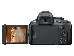 Nikon D5100 16.2 MP CMOS Digital SLR Camera Bundle with 18-55mm and 55-200mm VR AF-S Lenses N5