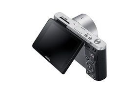 Samsung NX Mini 20.5MP CMOS Smart WiFi &amp; NFC Mirrorless Digital Camera with 9-27mm Lens and 3" Flip Up LCD Touch... N31