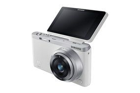 Samsung NX Mini 20.5MP CMOS Smart WiFi &amp; NFC Mirrorless Digital Camera with 9-27mm Lens and 3" Flip Up LCD Touch... N37