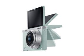 Samsung NX Mini 20.5MP CMOS Smart WiFi &amp; NFC Mirrorless Digital Camera with 9-27mm Lens and 3" Flip Up LCD Touch... N64