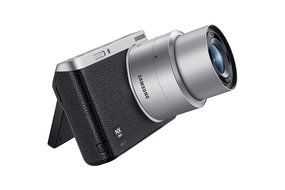 Samsung NX Mini 20.5MP CMOS Smart WiFi &amp; NFC Mirrorless Digital Camera with 9-27mm Lens and 3" Flip Up LCD Touch... N121