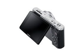 Samsung NX Mini 20.5MP CMOS Smart WiFi &amp; NFC Mirrorless Digital Camera with 9-27mm Lens and 3" Flip Up LCD Touch... N129