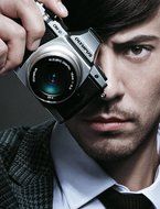 Olympus OM-D E-M5 16MP Live MOS Interchangeable Lens Camera with 3.0-Inch Tilting OLED Touchscreen and 12-50mm... N24