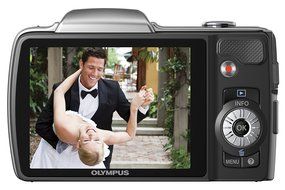 Olympus SZ-10 14 MP Digital Camera with 28mm Wide-Angle 18x Optical Zoom and 3" LCD (Silver) (Old Model) N4