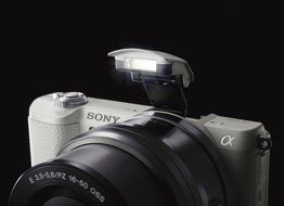 Sony a5100 16-50mm Mirrorless Digital Camera with 3-Inch Flip Up LCD (White) N39