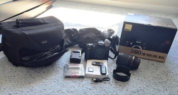 Nikon D90 12.3MP DX-Format CMOS Digital SLR Camera with 18-105 mm f/3.5-5.6G ED AF-S VR DX Nikkor Zoom Lens International... N3