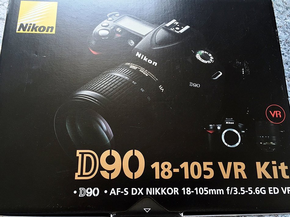 Nikon D90 12.3MP DX-Format CMOS Digital SLR Camera with 18-105 mm f/3.5-5.6G ED AF-S VR DX Nikkor Zoom Lens International... N2