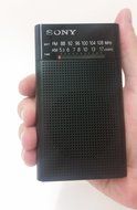Sony Portable AM/FM Transistor Radio with Built-in Speaker, Headphone Jack, LED Tuning Indicator &amp; Carry Strap... N2