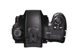 Sony Alpha SLT-A57M 16.1 MP Exmor APS HD CMOS Sensor DSLR with Translucent Mirror Technology and 18-135mm Lens N14