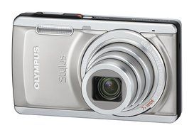 Olympus Stylus 7040 14 MP Digital Camera with 7x Wide Angle Dual Image Stabilized Zoom and 3.0 inch LCD (Pink)... N5
