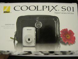 Nikon COOLPIX S01 10.1 MP Digital Camera with 3x Zoom NIKKOR Glass Lens (Silver) with Exclusive Clutch N3