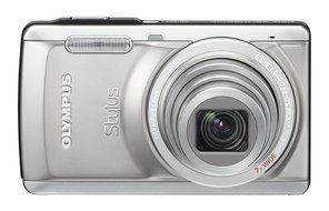 Olympus Stylus 7040 14 MP Digital Camera with 7x Wide Angle Dual Image Stabilized Zoom and 3.0 inch LCD (Pink)... N7