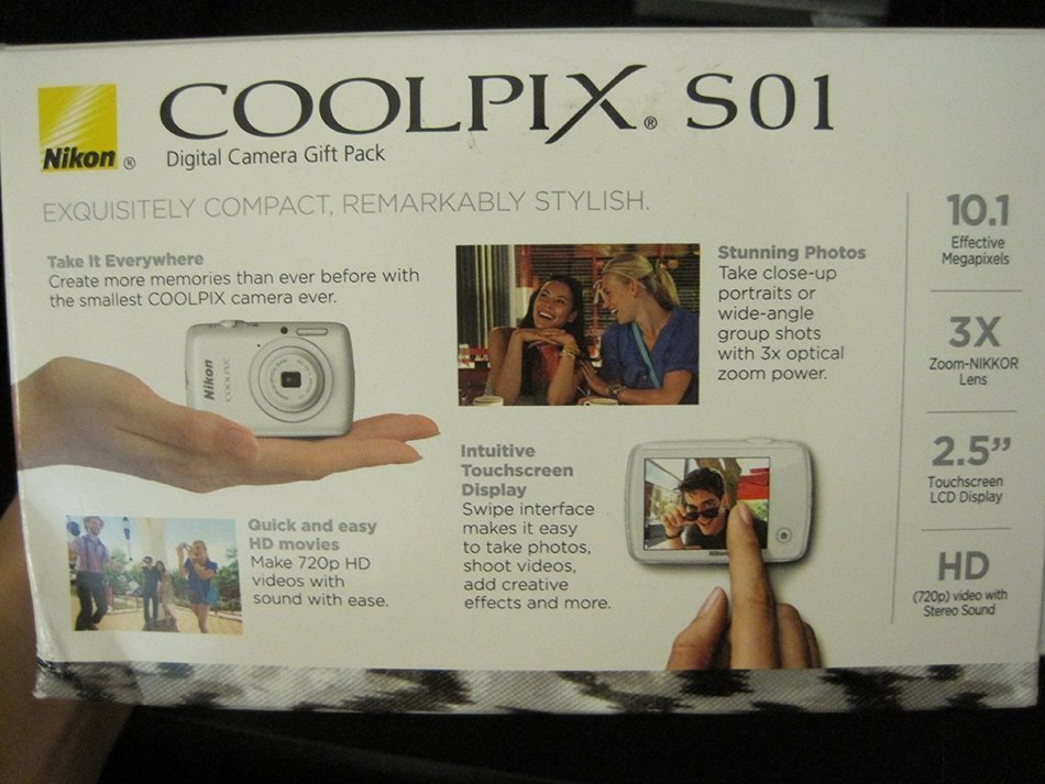 Nikon COOLPIX S01 10.1 MP Digital Camera with 3x Zoom NIKKOR Glass Lens (Silver) with Exclusive Clutch