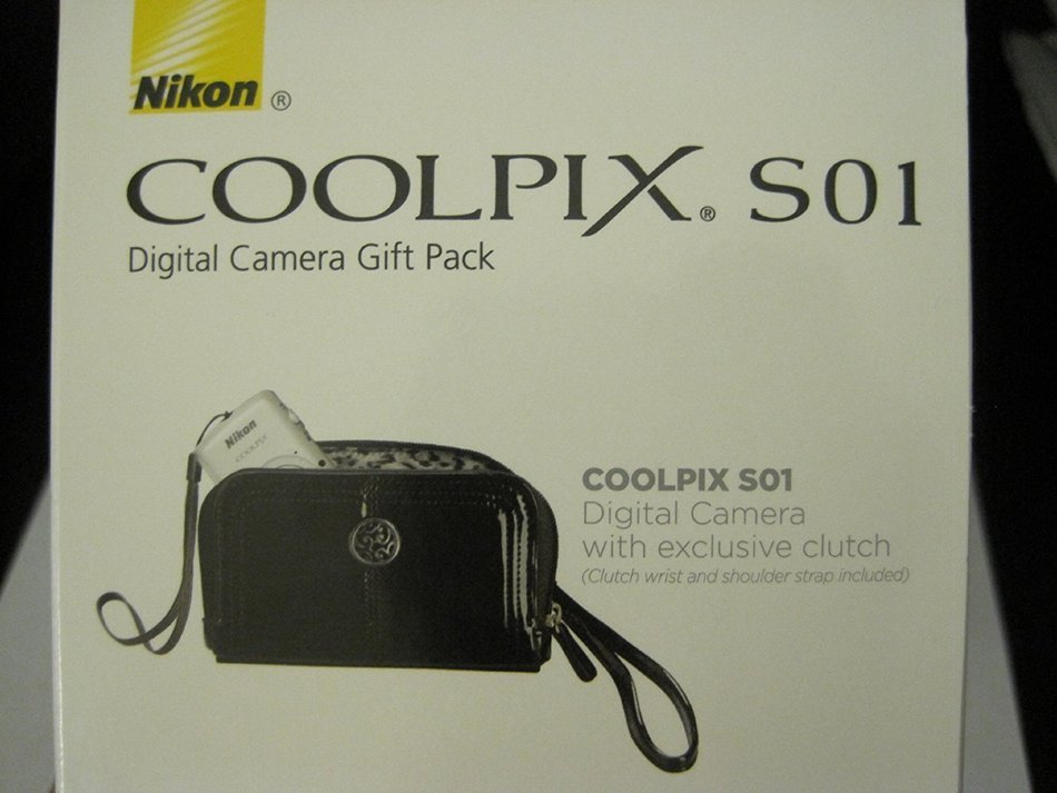 Nikon COOLPIX S01 10.1 MP Digital Camera with 3x Zoom NIKKOR Glass Lens (Silver) with Exclusive Clutch N2