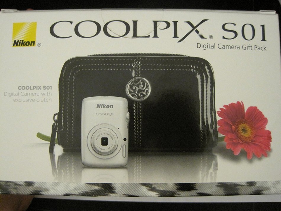 Nikon COOLPIX S01 10.1 MP Digital Camera with 3x Zoom NIKKOR Glass Lens (Silver) with Exclusive Clutch N3