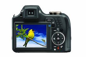 Olympus SP-590UZ 12MP Digital Camera with 26X Wide Angle Optical Dual Image Stabilized Zoom and 2.7 inch LCD N2