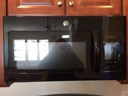 GE JNM6171DFBB 1.7 Cu. Ft. Black Over-the-Range Microwave