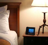 Electrohome EAAC601 Projection Alarm Clock with AM/FM Radio, Battery Backup, Auto Time Set, Dual Alarm, Nap/Sleep... N8