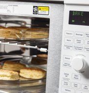 GE PVM9179DFWW Profile 1.7 Cu. Ft. White Over-the-Range Microwave - Convection