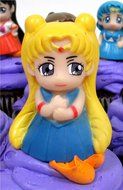 SAILOR MOON 8 Piece CUPCAKE Topper Set Featuring 6 Random Sailor Moon Figures and Decorative Themed Accessories... N8