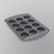 Non-Stick Muffin Pan with 12 - 1" Deep Cups from Wilton's Chef's Advantage Collection has Oversized Handles and...