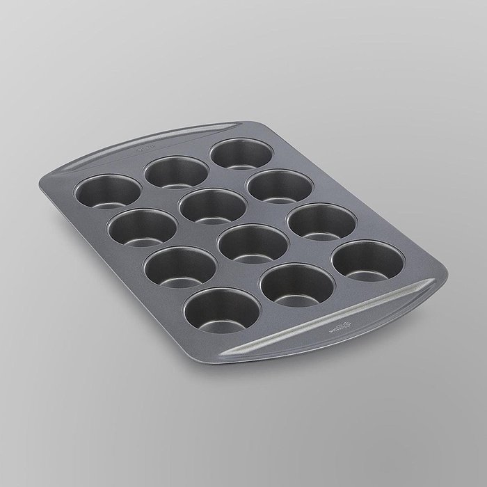 Non-Stick Muffin Pan with 12 - 1" Deep Cups from Wilton's Chef's Advantage Collection has Oversized Handles and...
