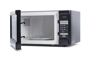 Westinghouse WCM11100W 1000 Watt Counter Top Microwave Oven, 1.1 Cubic Feet, White Cabinet N9