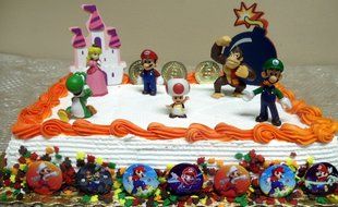 Mario Brothers 23 Piece Birthday Cake Topper Set Featuring Mario Castle, Bomb, Mario Coins, 6 Mario Figures Including...
