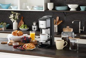 Mr. Coffee Grind n Brew Coffeemaker with Built-In Grinder and Travel Mug, SCGB200