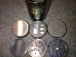 UNIQUE SCALE WITH A GRINDER ALL IN A NICE CAN. N4