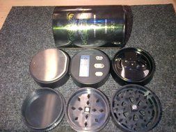 UNIQUE SCALE WITH A GRINDER ALL IN A NICE CAN. N8