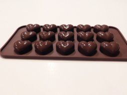 Set 2 silicone Chocolate Candy Molds; 1 Hearts mold and 1 mold of Hippos/Lions/Bears. Ice cubes, Candies, Gummies...